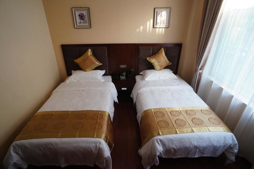 Sunshine Holiday Hotel Liaocheng Екстер'єр фото